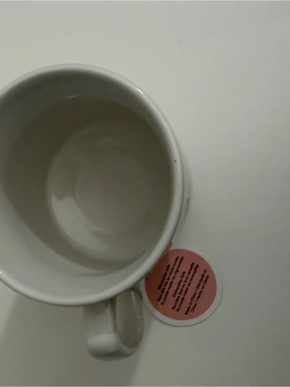White Ceramic Pedestal Mug with Playful Face